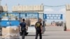 FILE - Trucks carrying humanitarian aid slated for Gaza await clearance at the Kerem Shalom (Karm Abu Salem) border crossing on March 14, 2024 amid the ongoing conflict between Israel and the Palestinian militant group Hamas. 