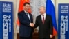 Chinese President Xi Jinping, left, and Russian President Vladimir Putin shake hands during their meeting on the sidelines of BRICS summit at Kazan Kremlin in Kazan, Russia, Oct. 22, 2024. 