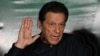 FILE - Former Pakistani Prime Minister Imran Khan speaks to reporters at his residence in Lahore, May 18, 2023. A Pakistani court indicted the jailed Khan and several associates Dec. 5, 2024, for allegedly inciting supporters to attack military installations in 2023.