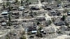 An aerial shot shows widespread destruction caused by Cyclone Kenneth when it struck Ibo island north of Pemba city in Mozambique, May, 1, 2019. More than 22 inches (55 centimeters) of rain have fallen in Pemba since Kenneth arrived.