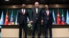 Turkish President Tayyip Erdogan (C) poses with Somali President Hassan Sheikh Mohamud (R) and Ethiopian Prime Minister Abiy Ahmed following a press conference in Ankara, Turkey, Dec. 11, 2024. Murat Kula/Presidential Press Office/Handout via Reuters. 