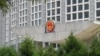 FILE - China's national emblem is seen on the Ministry of Foreign Affairs building in Beijing, July 26, 2023.