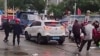 This frame grab taken from video footage circulating on Chinese social media on Nov. 19, 2024 shows the scene where a car crashed outside the Yong'an primary school in Changde. (AFP photo / Chinese social media) 