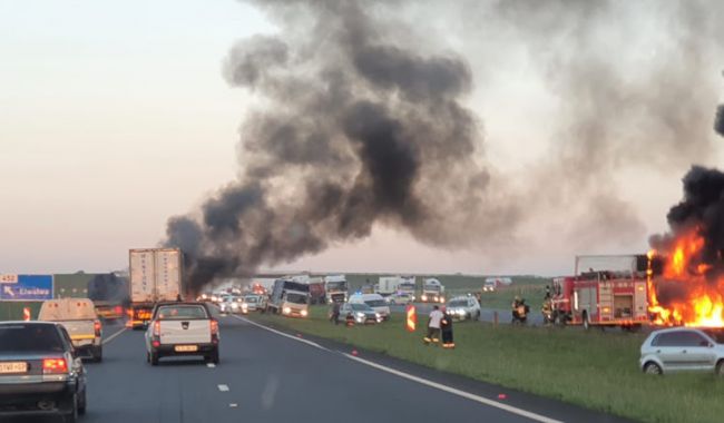 WATCH | N12 in Joburg closed until further notice after two trucks torched