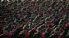 Cadets of Iran's Islamic Revolutionary Guard Corps march in a parade outside Tehran, Sept. 21, 2024. The U.S. on Sept. 27, 2024, filed charges against three members of the Guard, accusing them of hacking to interfere with U.S. elections.