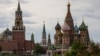 FILE - A general view on the Spasskaya tower of the Kremlin and St. Basil's Cathedral in Moscow, May 16, 2024. 