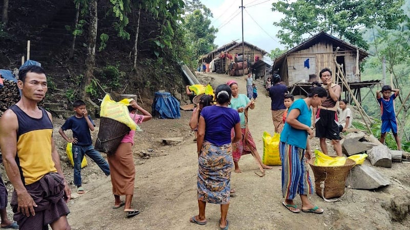 People from Paletwa town in Myanmar are seen at the Kakiswa Refugee Camp in the Longtharai district of India on June 2, 2024.