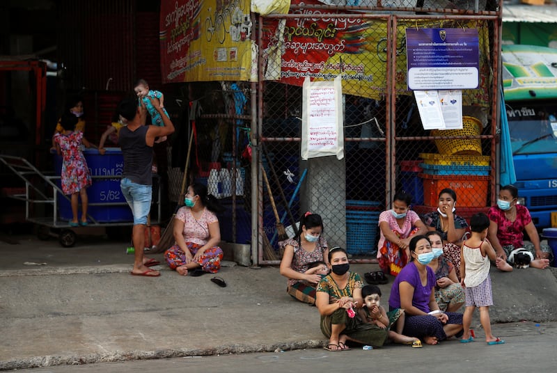 Myanmar migrant worker families pass their time under barricade lockdown at Samut Sakhon Shrimp in Samut Sakhon, Thailand, Jan. 26, 2021.