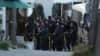 Police arrive at the gate of the presidential residence as supporters of impeached South Korean President Yoon Suk Yeol rally against a court's issuance of a warrant to detain Yoon, in Seoul, South Korea, Jan. 3, 2025. 