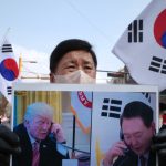 South Korean anti-corruption agency seeks police help in arresting impeached president